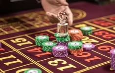 BetUS Casino casino presented on mobile device in Pakistan with slots and live games